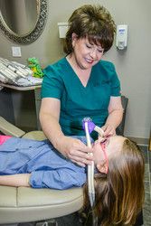 Girl at pediatric dentistry appointment